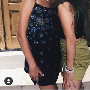 Free people dress with sparkles, fits loose